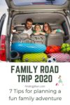 image of family in packed car