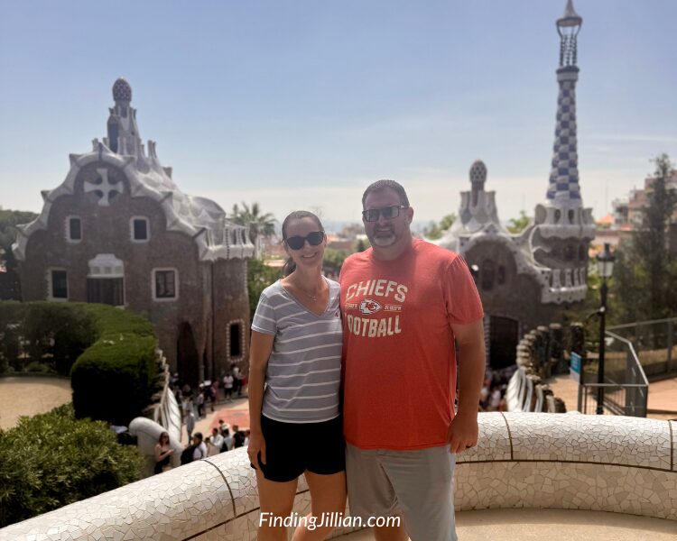 husband and wife (findingjillian.com)standing at Park Guell