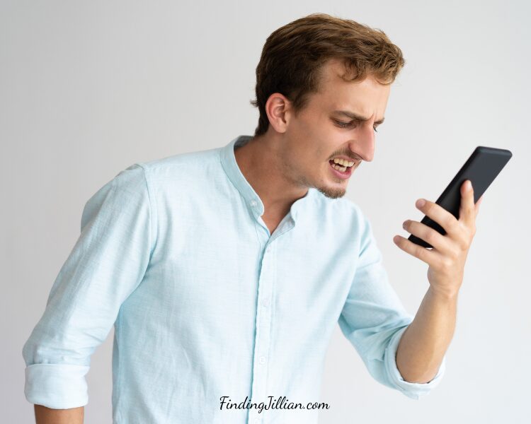 man yelling into a cell phone