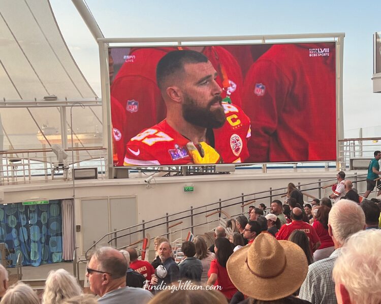 image of travis kelce during national anthem of 2024 superbowl on Harmony of the Seas